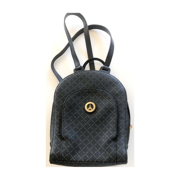 blue one handle backpack leather vintageparis Convertible Purse This structured unisex bag features six external pockets and five internal ones Vintage La Tour Eiffel Paris
